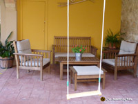 Fotografías del jardín, de la piscina, del porche, la barbacoa y la pista de petanca de Cal Sabater d'Ordis
